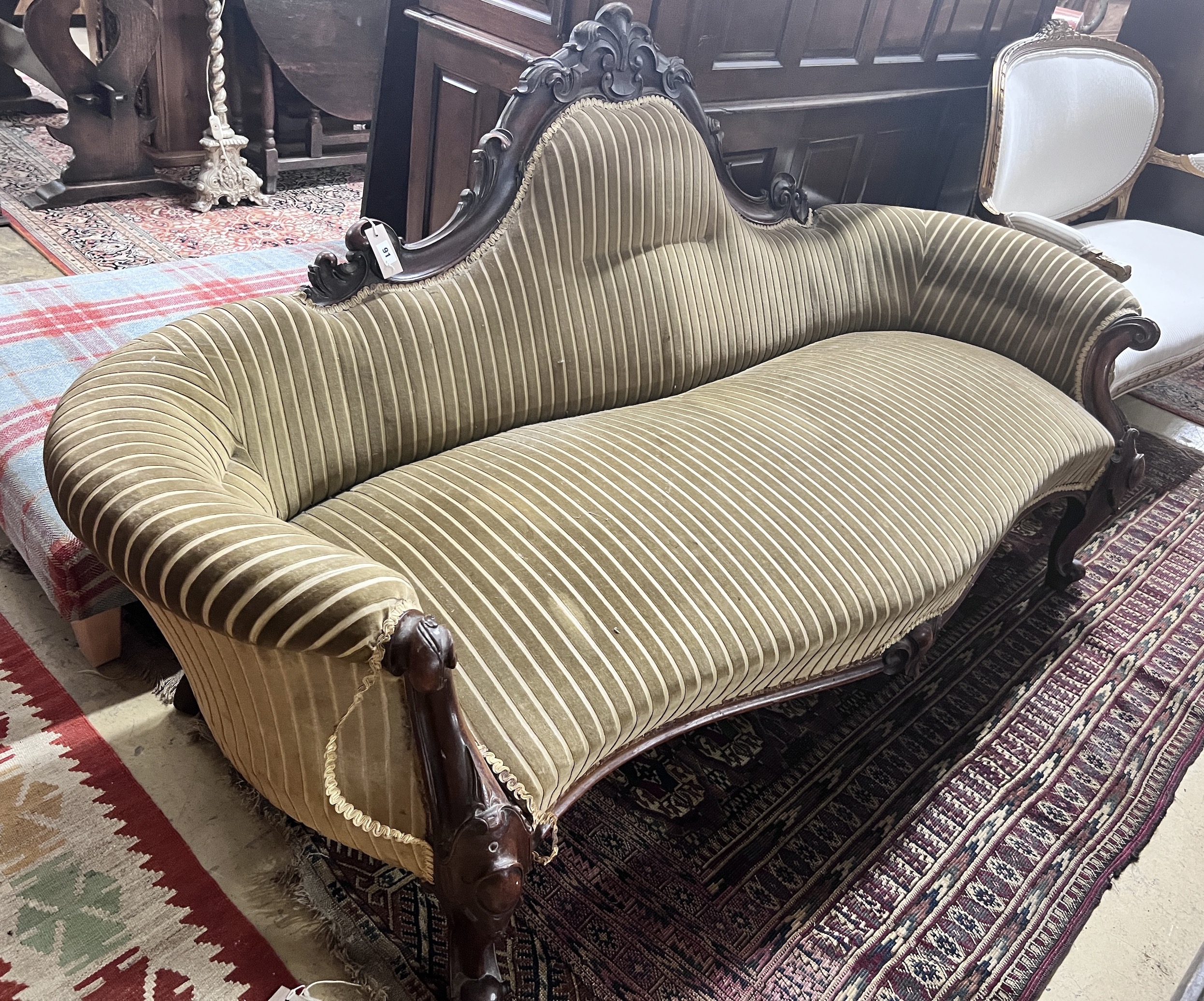 A Victorian carved mahogany settee, length 190cm, width 74cm, height 93cm